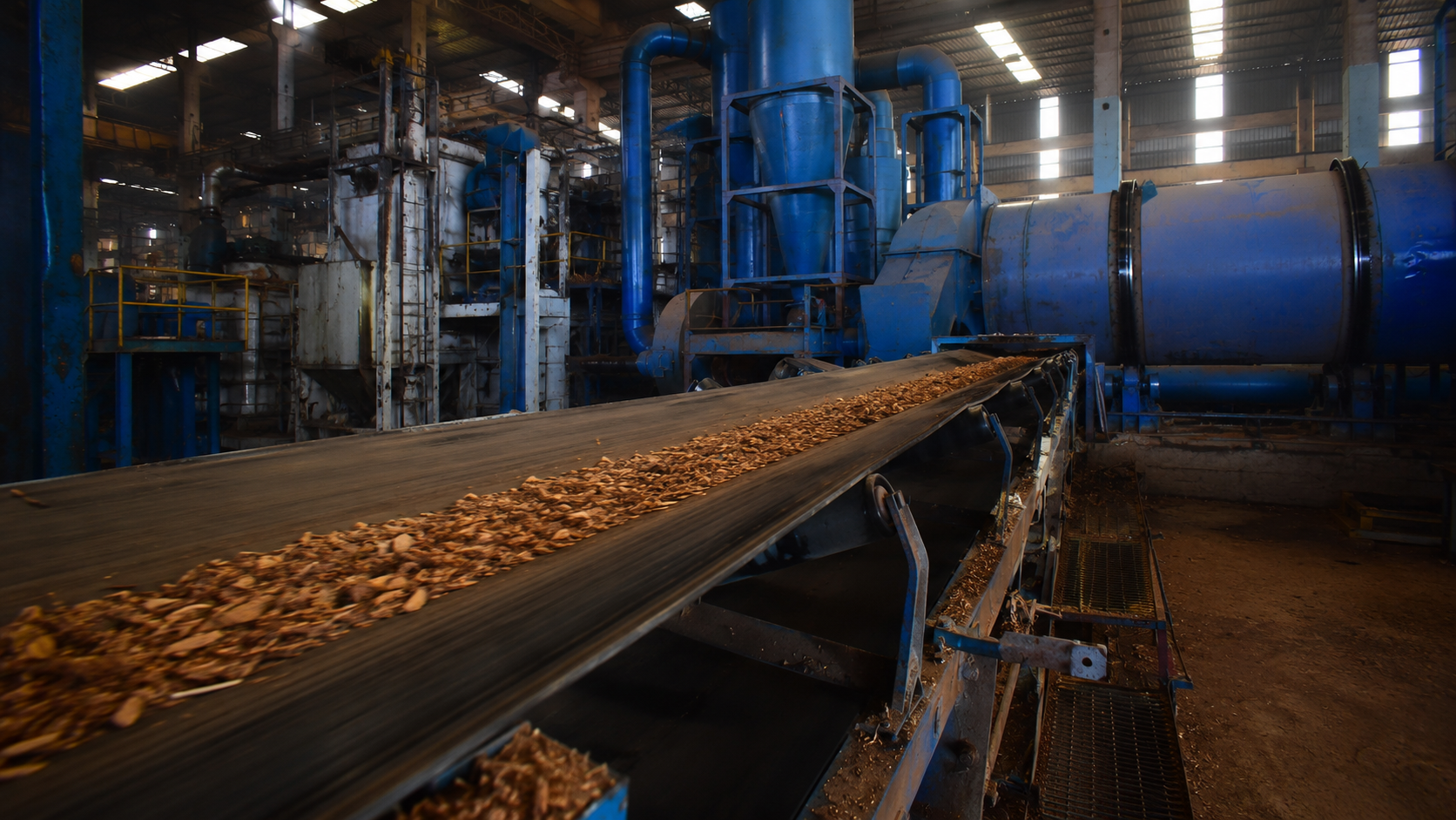Biomass conveyor feeding rotary kiln at India operations