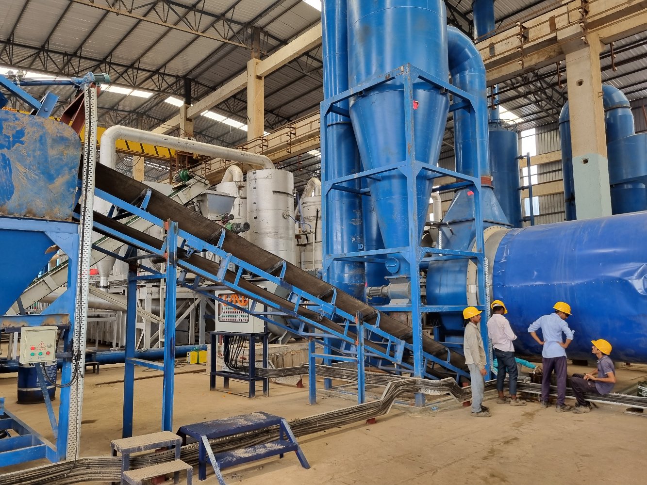 Automated biomass to biochar conveyor and kiln setup