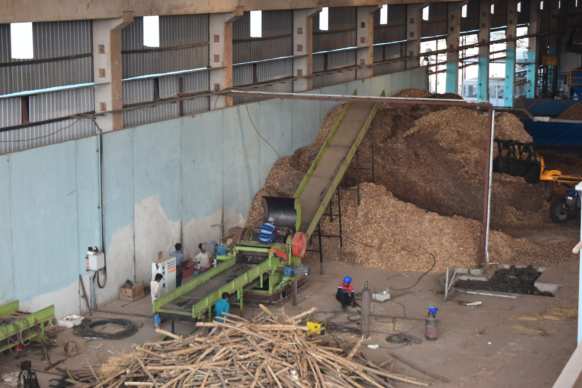 Biomass material handling at the production facility