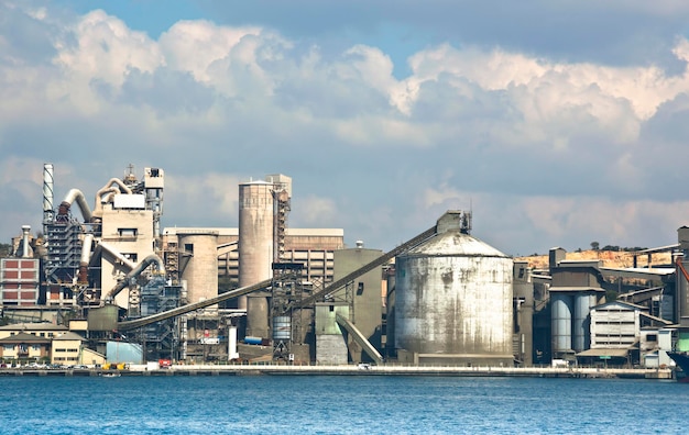 Cement plant silos, conveyors, and kiln towers